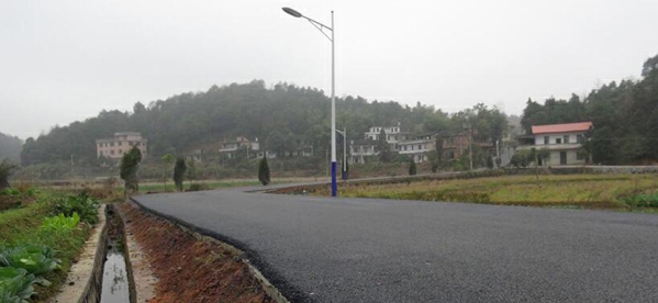 甘宁镇就胜村永康路道路油化工程